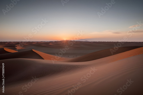 A breathtaking sunset over a vast desert with dunes and sparse vegetation