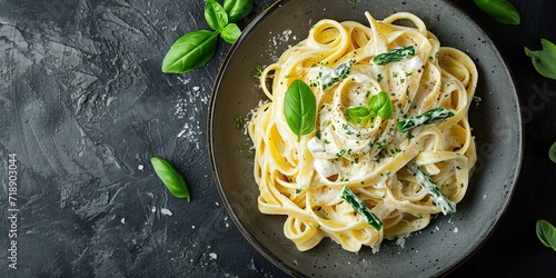 Freshly prepared yellow pasta , dry and cooked pasta , egg pasta , fettuccine , tagliatelle , pasta without sauce with cheese , Italian cuisine , background , wallpaper.