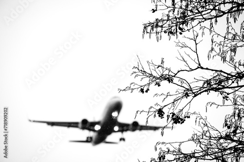 Silhouette of airplane in the sky close-up