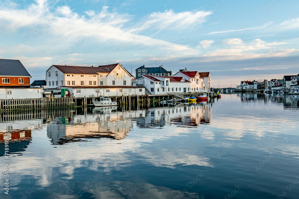 scenic reflection of typical wooden houses in the harbor of Svolvaer,Norway - obrazy, fototapety, plakaty 