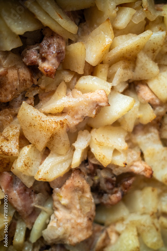 fried meat and potato, indoor vertical closeup shot