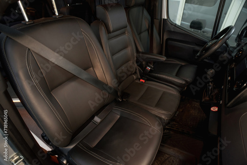 Comfortable interior of a passenger bus with soft seats. The design is made to order. Private covering of cars. Various elements of the bus interior. © Kaminski Vadim
