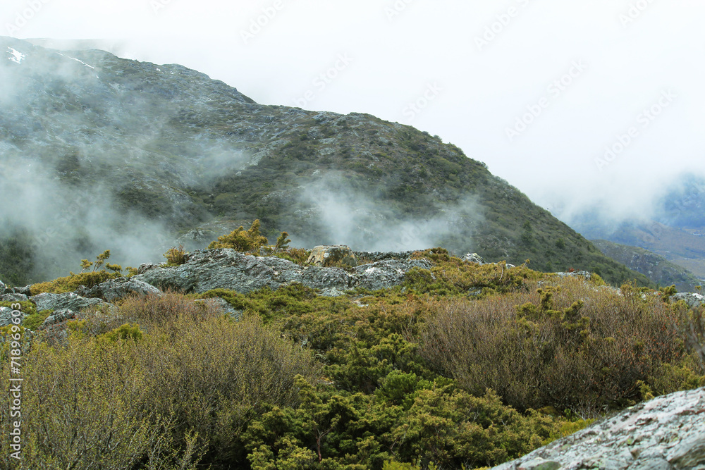 Rugged countryside with low hanging mist Rugged countryside with low hanging mist