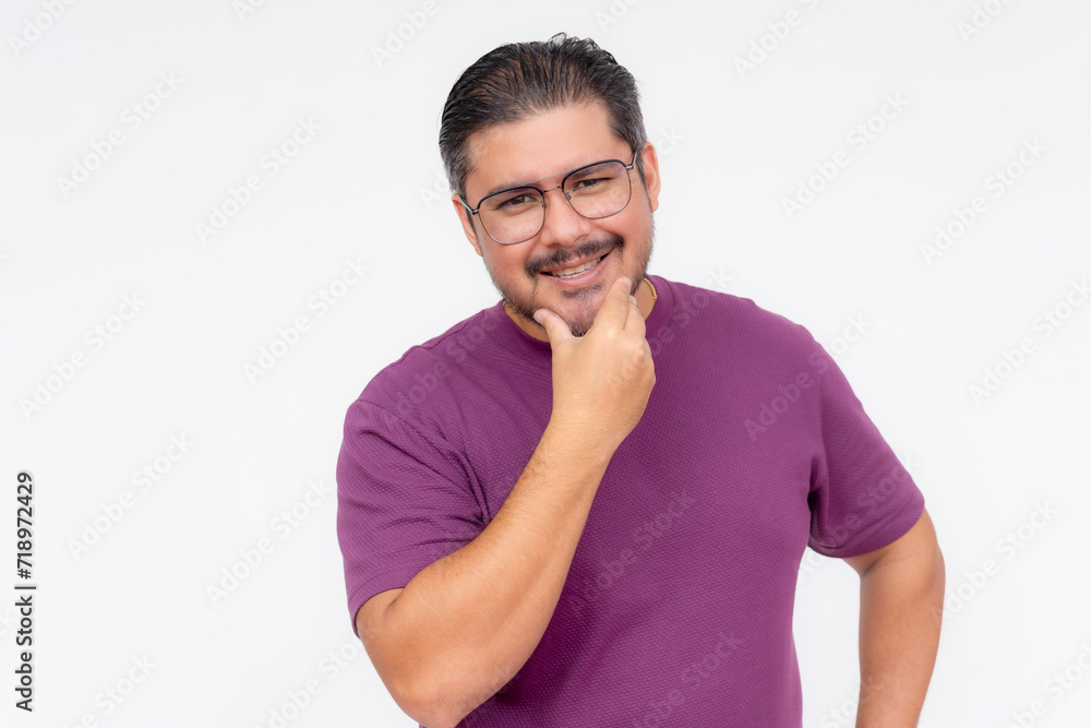 Portrait of a cheerful, confident man with glasses smiling and touching his chin, isolated on a white background. Portrait of a cheerful, confident man with glasses smiling and touching his chin, isolated on a white background.