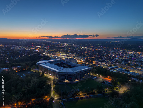 Aerial panoramic skyline cityscape of Kaiserslautern city and and stadium at night  blue hour . Rhineland-palatinate  Germany