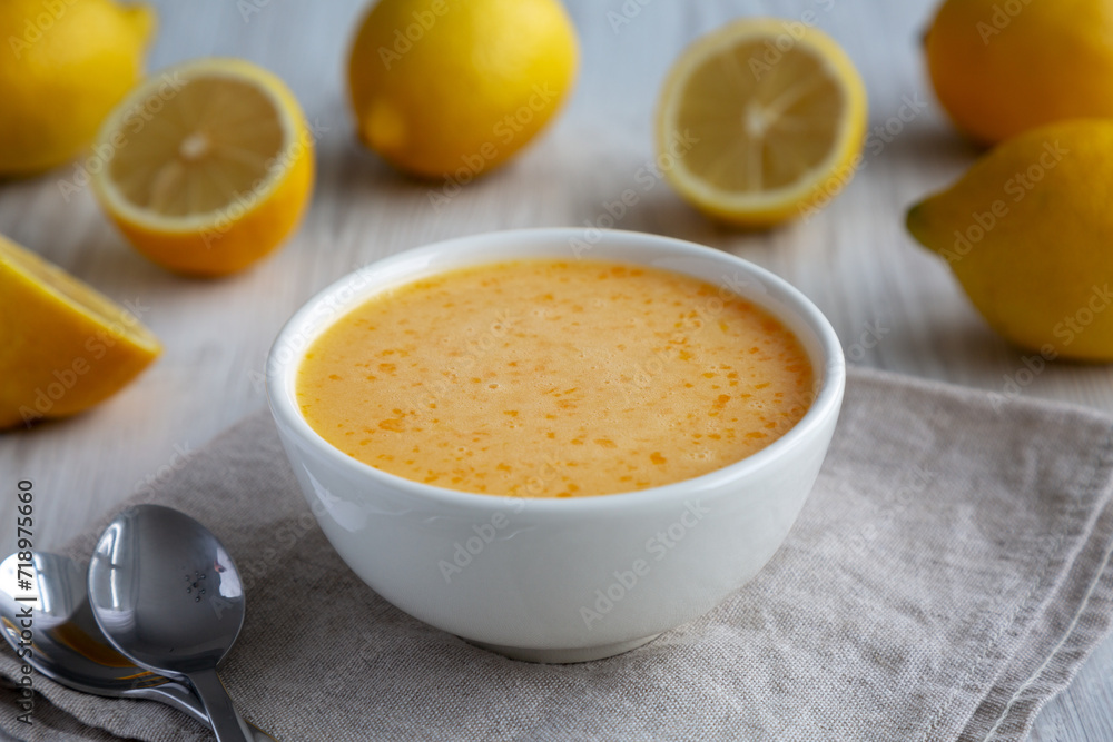 Homemade Organic Lemon Curd in a Bowl, side view. Homemade Organic Lemon Curd in a Bowl, side view.