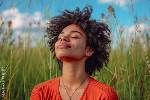 Fictional Black woman relaxing at a tranquil place in the nature. Concept of healing reflections: contemplative moments of self-care and self-soothing and enjoying life allergy-free. 
 photo