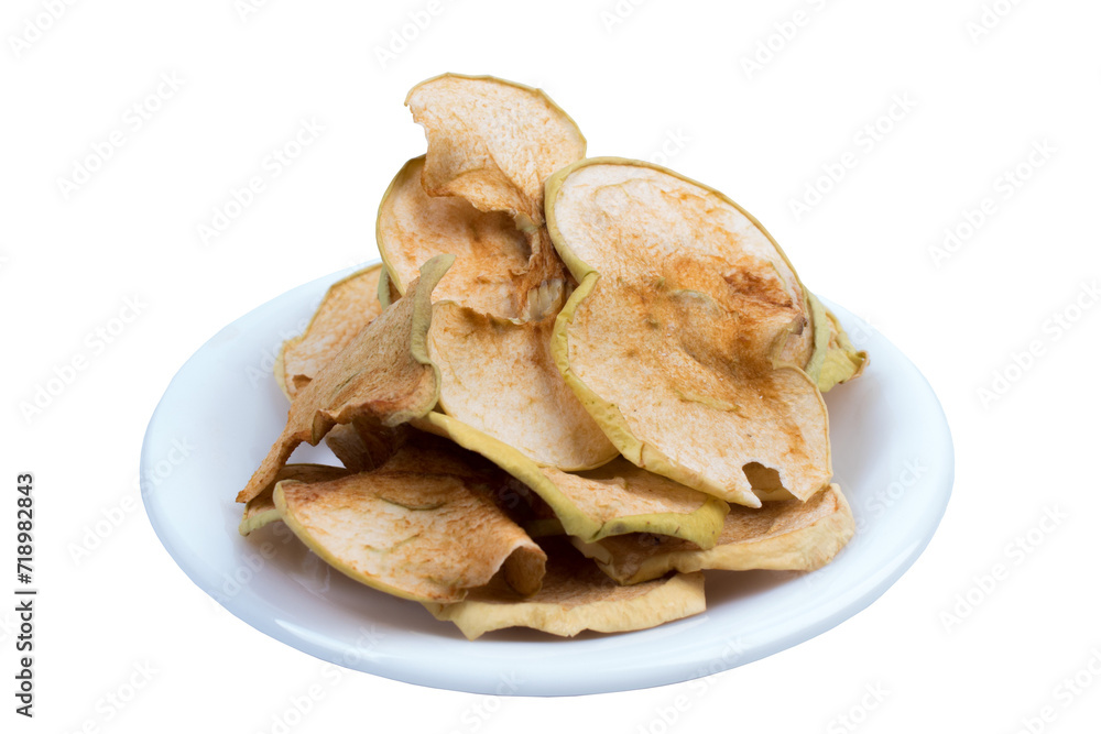 Sliced, dried apples in a plate isolated on white background. Homemade organic apple.