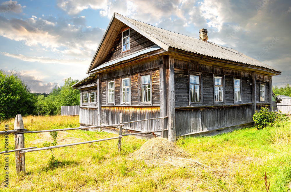 Old abandoned rural wooden house in russian village