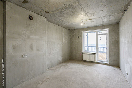 rough repairs for self-finishing. interior decoration, bare walls of the room, stage of construction. interior apartment room