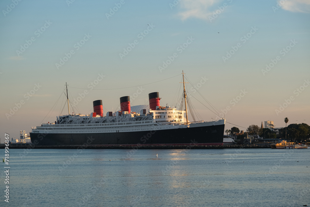 World famous tourist destination and historic ocean liner cruiseship cruise museum ship hotel in port of Long Beach, California USA World famous tourist destination and historic ocean liner cruiseship cruise museum ship hotel in port of Long Beach, California USA