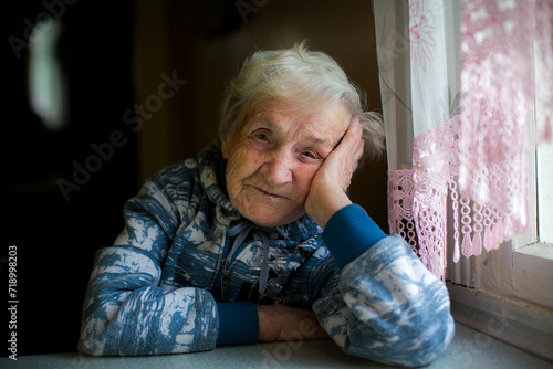Portrait of an older woman in her home.