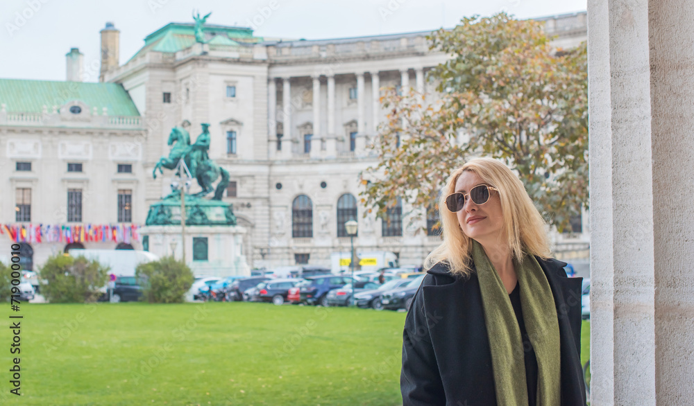 Vacation in Austria - Vienna. Concept of tourism and holidays. Woman in city streets, urban scene
