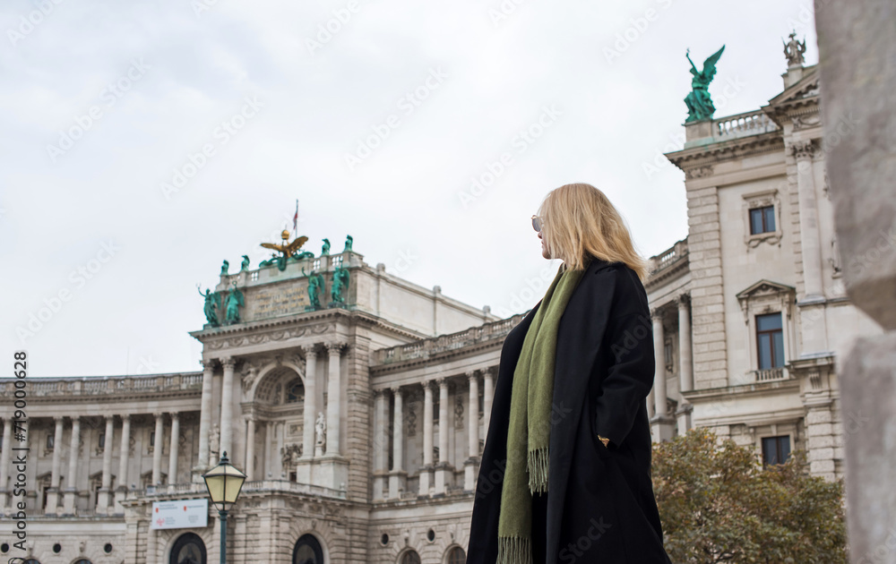 Vacation in Austria - Vienna. Concept of tourism and holidays. Woman in city streets, urban scene