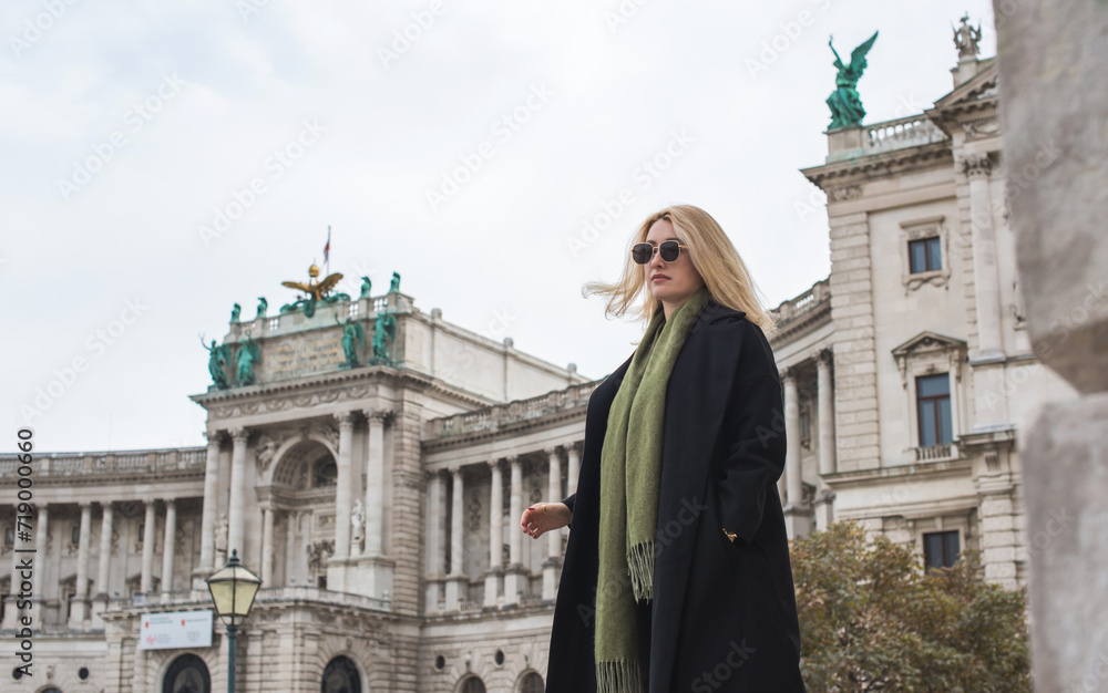 Vacation in Austria - Vienna. Concept of tourism and holidays. Woman in city streets, urban scene