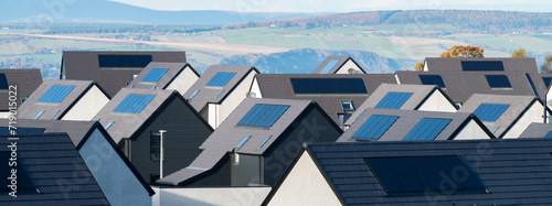 Houses with solar panels build into the roofs in Sctoland, UK photo