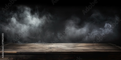 Dark background with smoking old wooden table top.