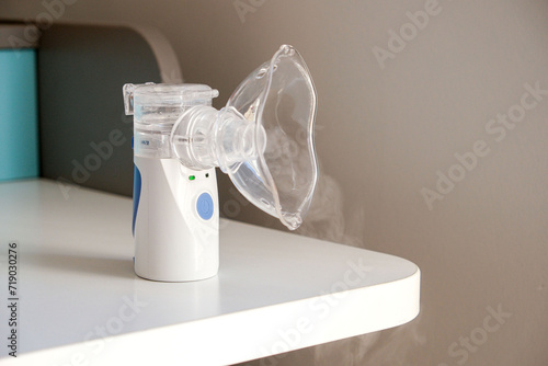 Oxygen mask of nebulizer with steam, medical equipment for pneumonia, covid, sars and bronchitis treatment. Inhaler, respiratory pulmonary disease, child allergy