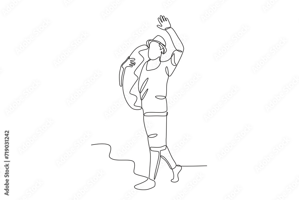 A man carrying a swimming balloon A man carrying a swimming balloon