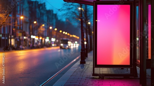 Realistic street billboard, vertical mockup. City illuminated banner with frame for outdoor advertising. Screen template for presentation, promotion, information and design. Copy space.