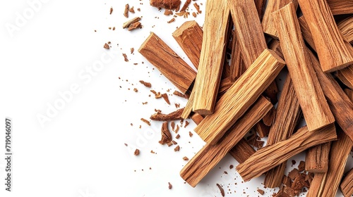 Stacked sandalwood sticks isolated against a white backdrop, big copy space, Generative AI. photo