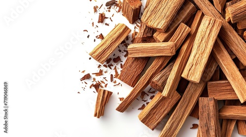 Stacked sandalwood sticks isolated against a white backdrop, big copy space, Generative AI.