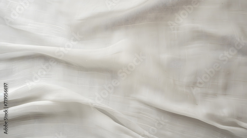 Soft draped neutral beige linen fabric texture, textile background with abstract folds