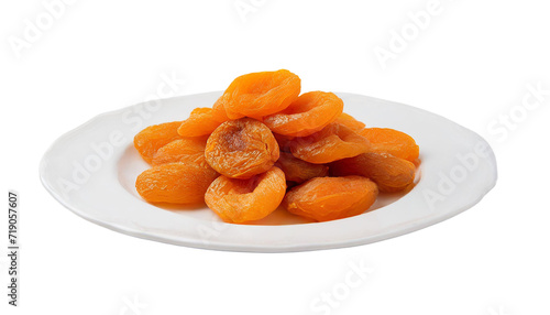 Dried apricots on a white plate isolated on transparent background.