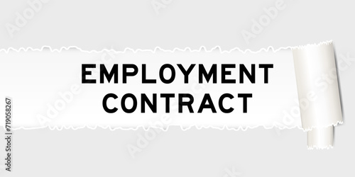 Ripped gray paper background that have word employment contract tunder torn part