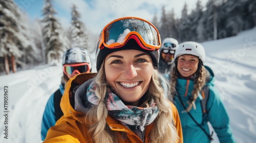 Portrait of group of friends with skis and snowboards on winter holidays