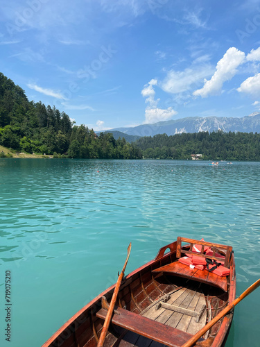 Boat in the blue clear water and bright sky summer at the Lake Bled, Slovenia © Lineprint