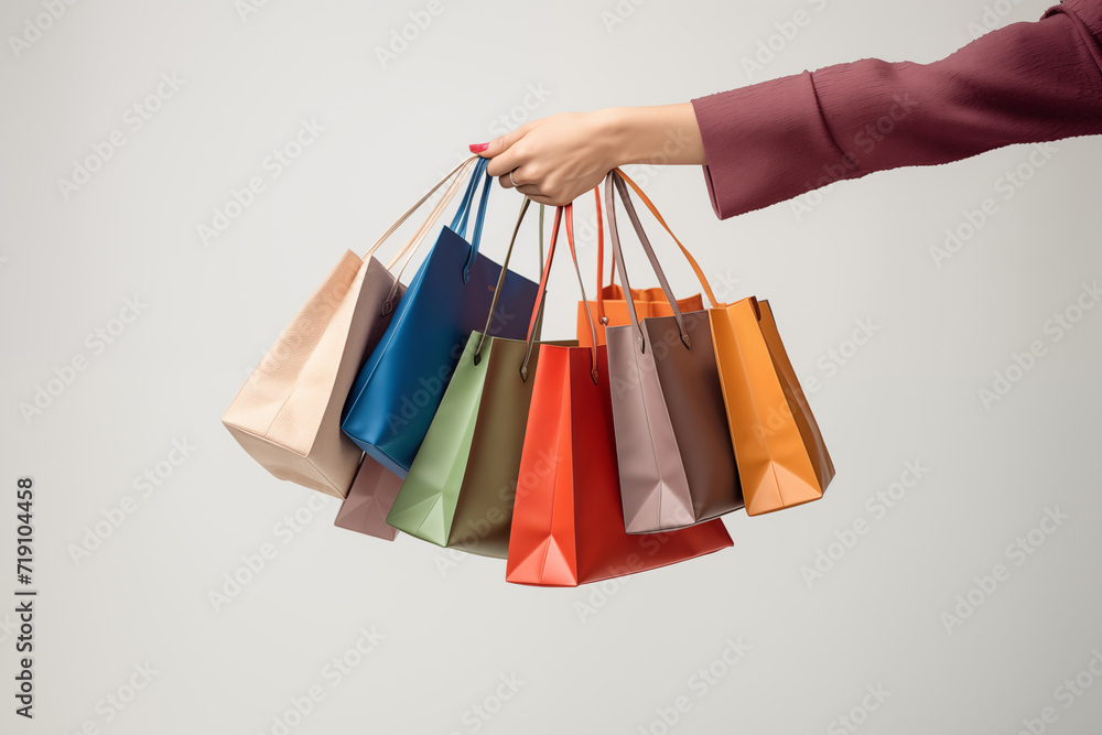 Woman hand holding shopping bags