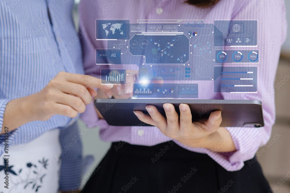 Business hands using digital tablet with business infographic data concept, Analytics data dashboard.