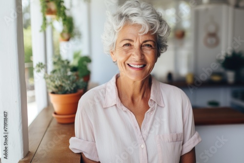 Portrait of a senior woman smiling at home
