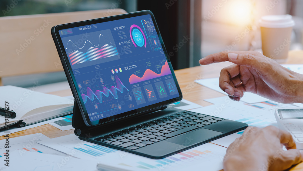 Business hands working on digital tablet with business infographic data concept, Analytics data dashboard. Business hands working on digital tablet with business infographic data concept, Analytics data dashboard.