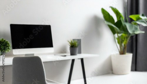 Immagine orizzontale studio con scrivania computer e piante minimal bianco generato con ai photo