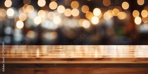 Wooden counter with bokeh light background  serving as a backdrop for displaying products in a retail shop.