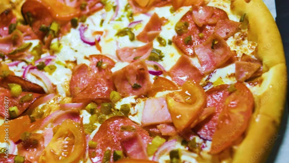 Fresh Italian tomato salami jalapeno pizza. Close up. Fresh Italian tomato salami jalapeno pizza. Close up.