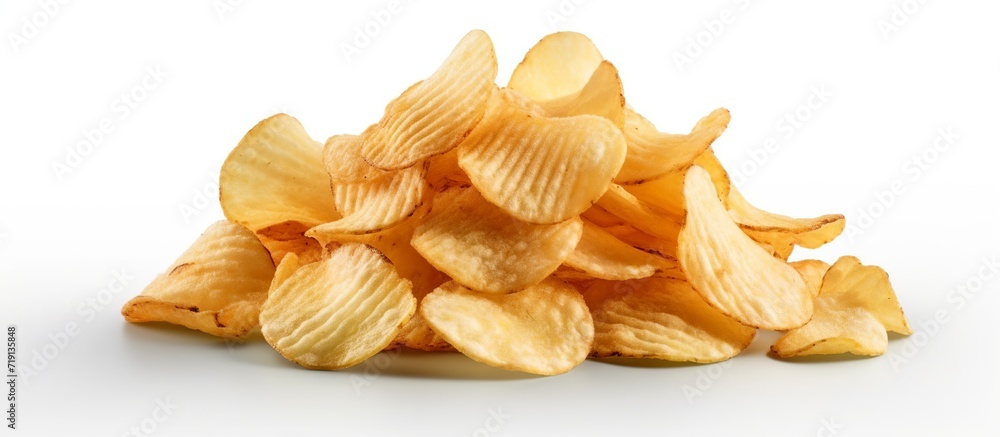 Pile of tasty potato chips, isolated on white background Pile of tasty potato chips, isolated on white background