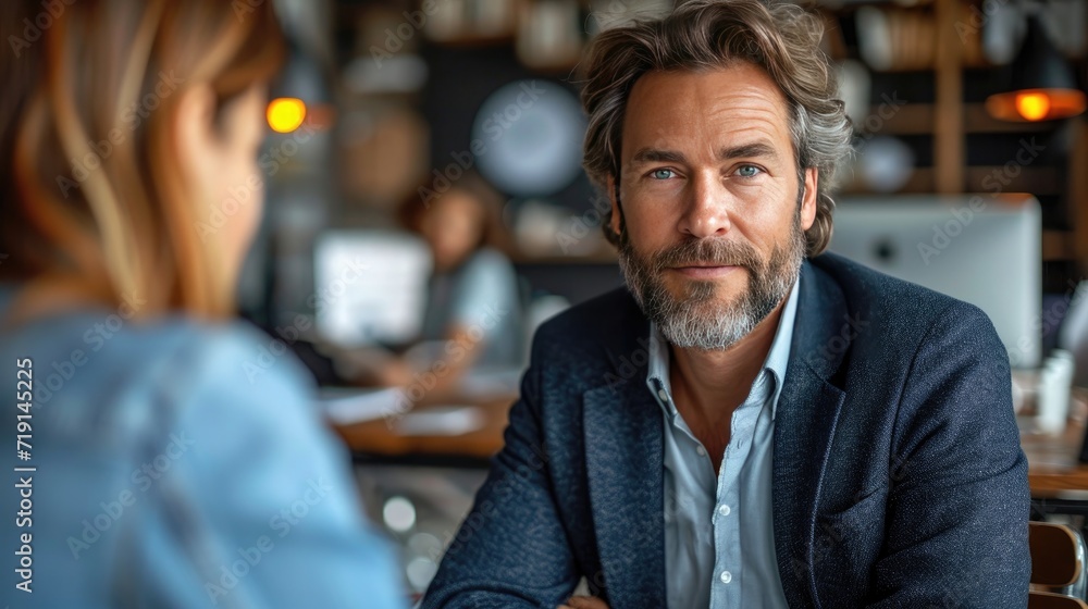 A professional setting of a financial advisor consulting with a client, both in business attire