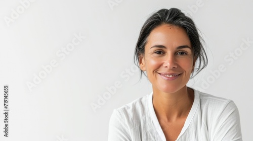 Close up portrait of young happy woman looking in camera