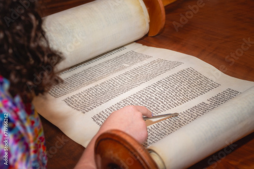 Reading the torah at a bat mitzvah photo