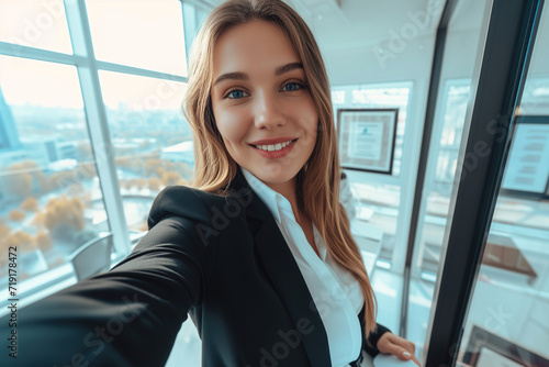 Selfie of a beautiful business woman in the office
