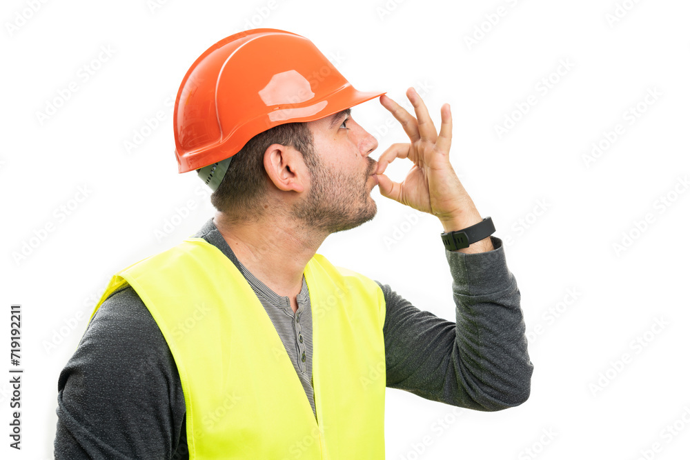 Happy constructor male making italian chef kiss with fingers Happy constructor male making italian chef kiss with fingers