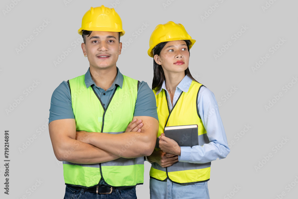 Asian Couple Engineer and Architect giving gestures and expressions on construction field Asian Couple Engineer and Architect giving gestures and expressions on construction field