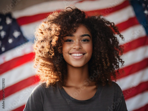 Portrait of a happy beautiful black girl with American flag curly hair