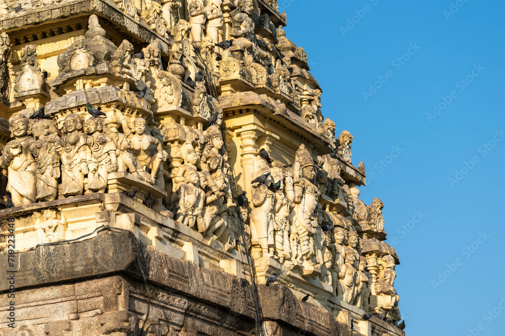 Fototapeta premium Carvings of Hindu deities and figures on the gopuram tower of the Chennakeshava temple in Belur, Karnataka.