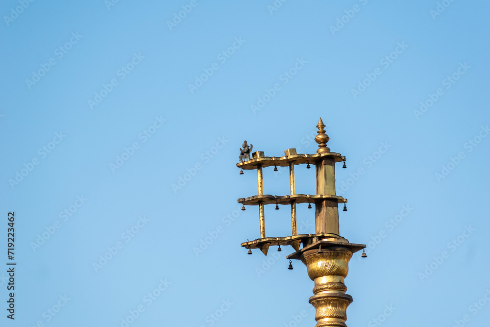 The golden Dhwaja Stambh pillar in the historic Chennakeshava temple in Belur.