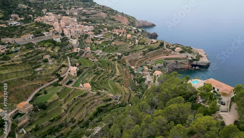 Aerial drone video footage of Banyalbufar Village in Palma de Mallorca Spain photo