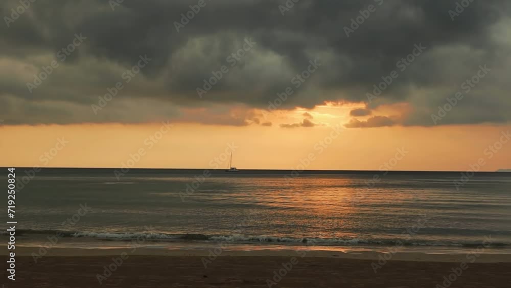 Orange sunset and cloudy sky on the beach of Thailand Orange sunset and cloudy sky on the beach of Thailand